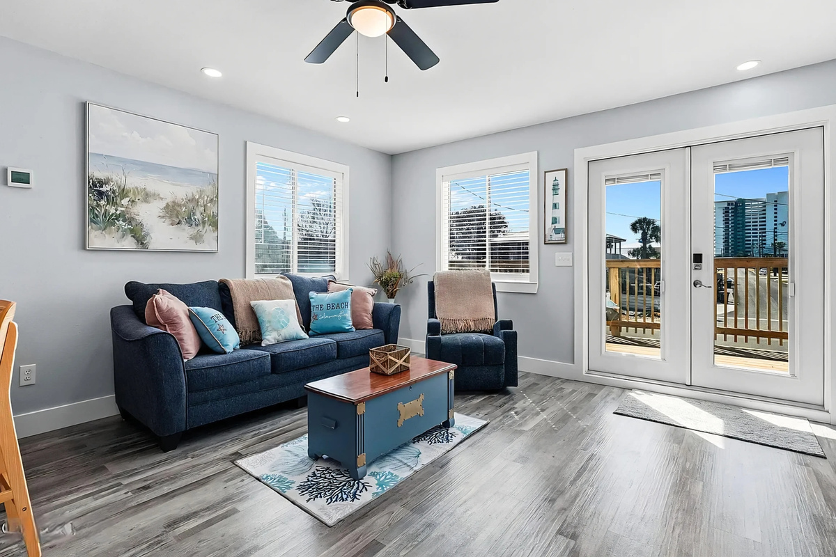 Biltmore Beach Coastal (2nd floor) living area with sofabed and access to the balcony