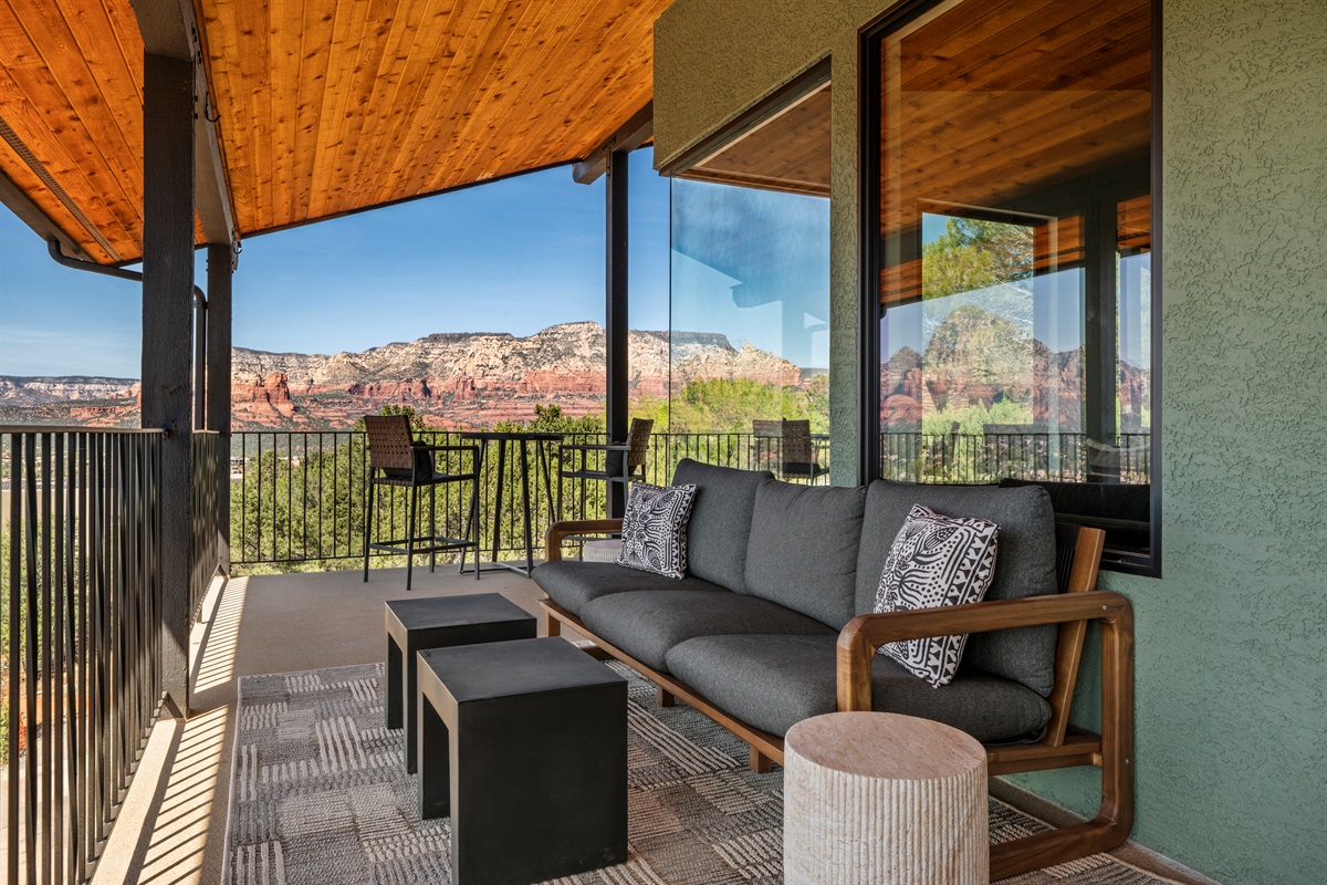 Relax outdoors with comfortable seating and panoramic Sedona views.