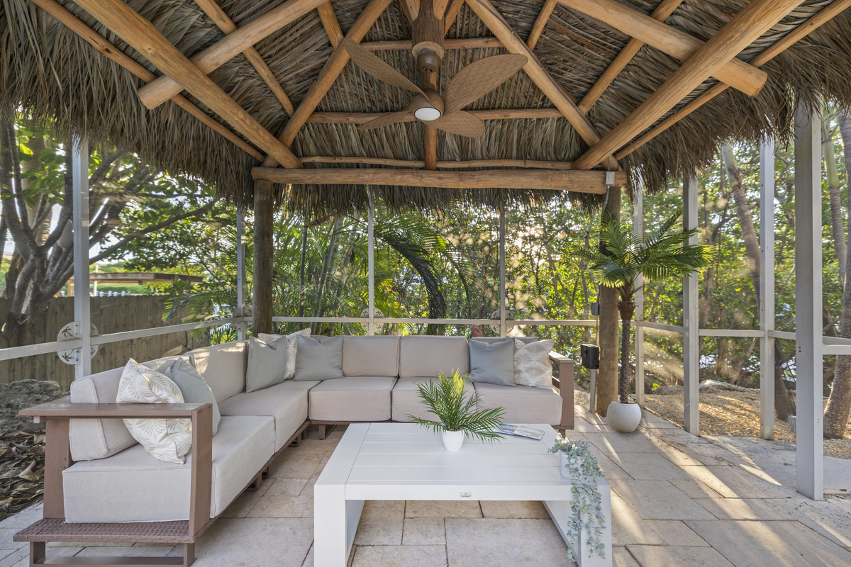 A great place to relax in the shade, away from any bugs, near the pool.