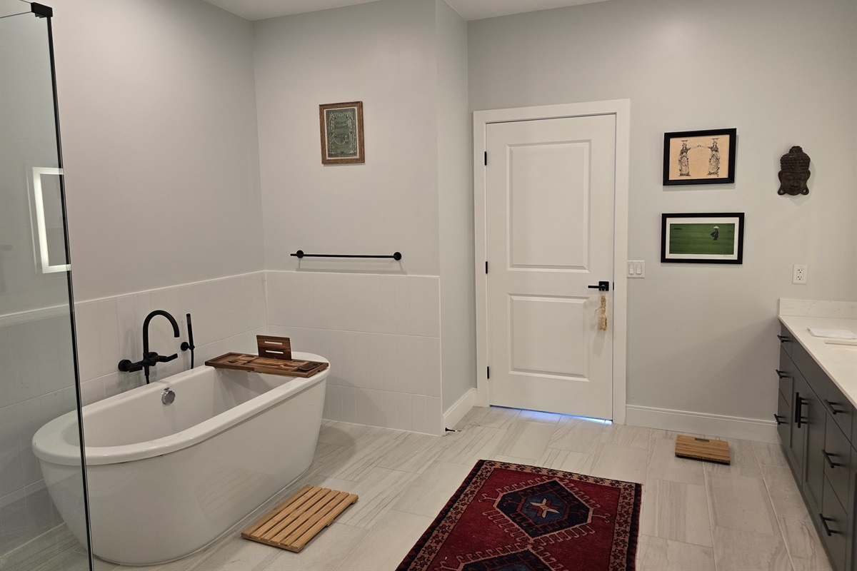 Soaking tub and spa experience giant bathroom