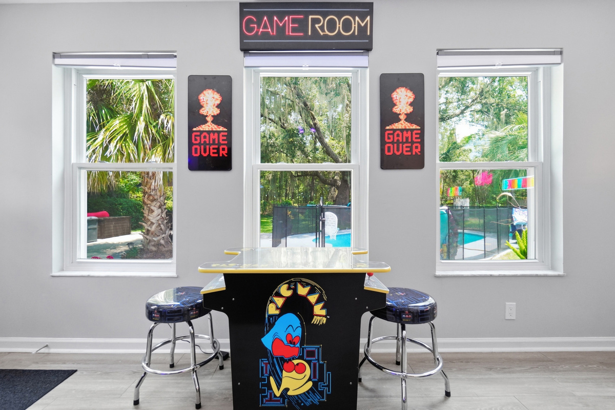 Challenge your group to the tabletop arcade game while enjoying views of the backyard pool area.