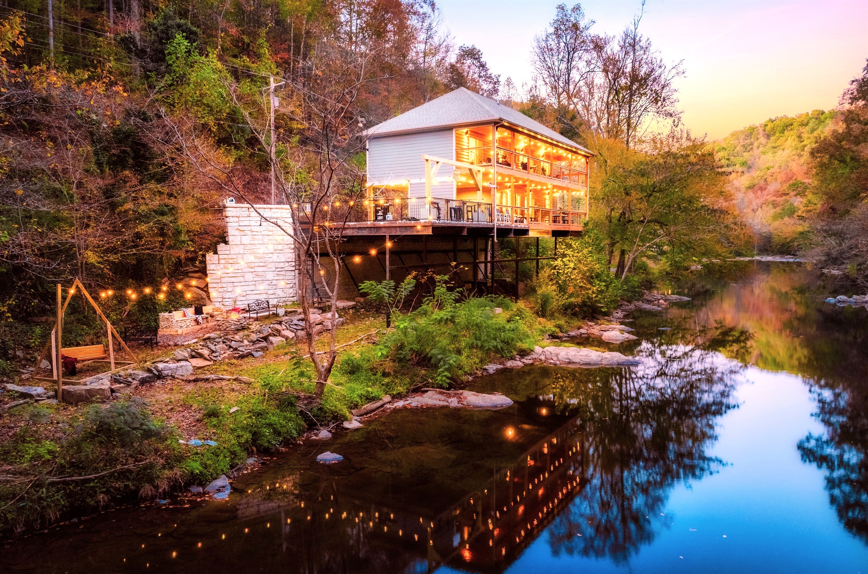 Our cabin is perched right above the famous "Little Pigeon River" in Gatlinburg, TN. Welcome to "Take Me to the River Cabin"