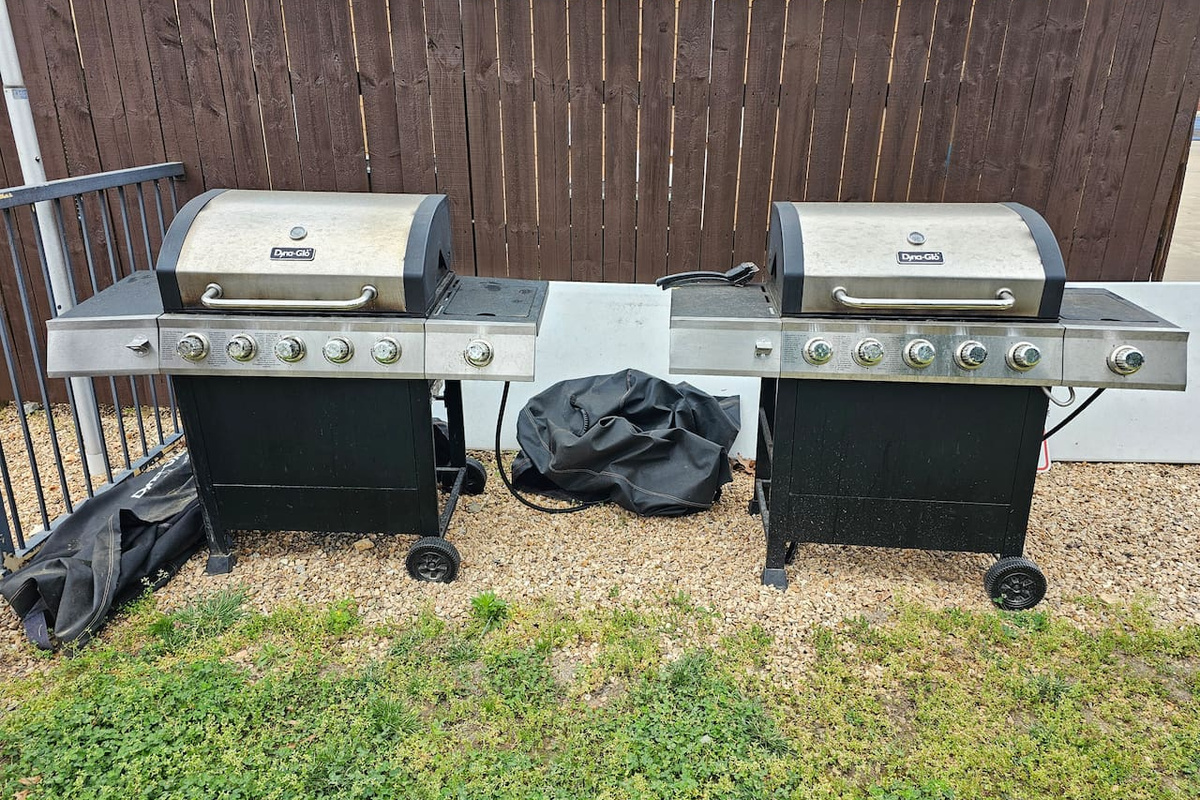 Outdoor community gas grills ready for cookouts & family dinners
