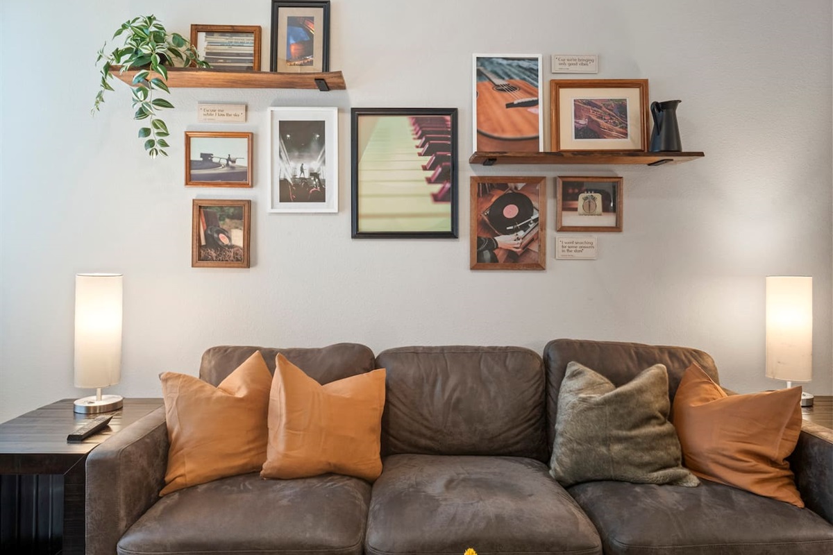 Living room with pull out couch with a Queen memory foam mattress. 