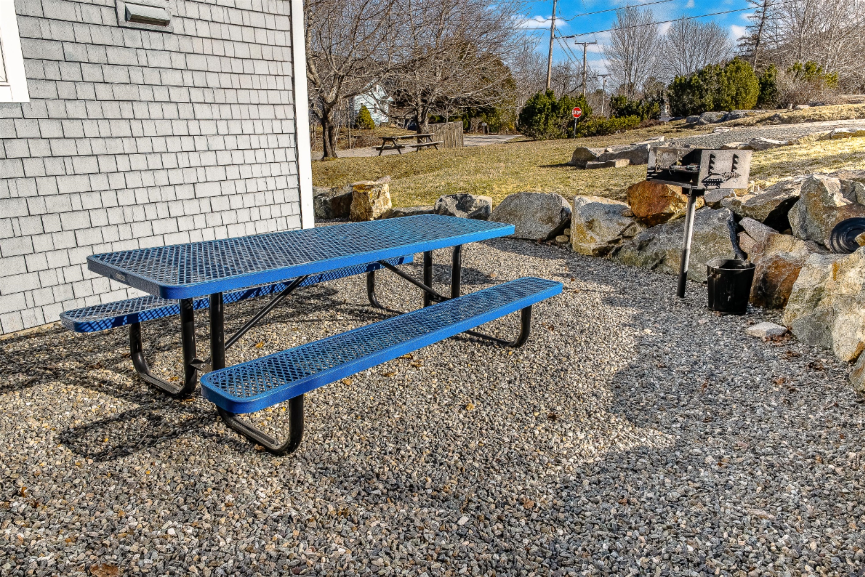 Fire up the built-in charcoal grill for an authentic Maine cookout. This picnic area, framed by rugged Maine granite, is the perfect spot for your group to refuel and share trail stories in the fresh island air after a day of outdoor exploration.