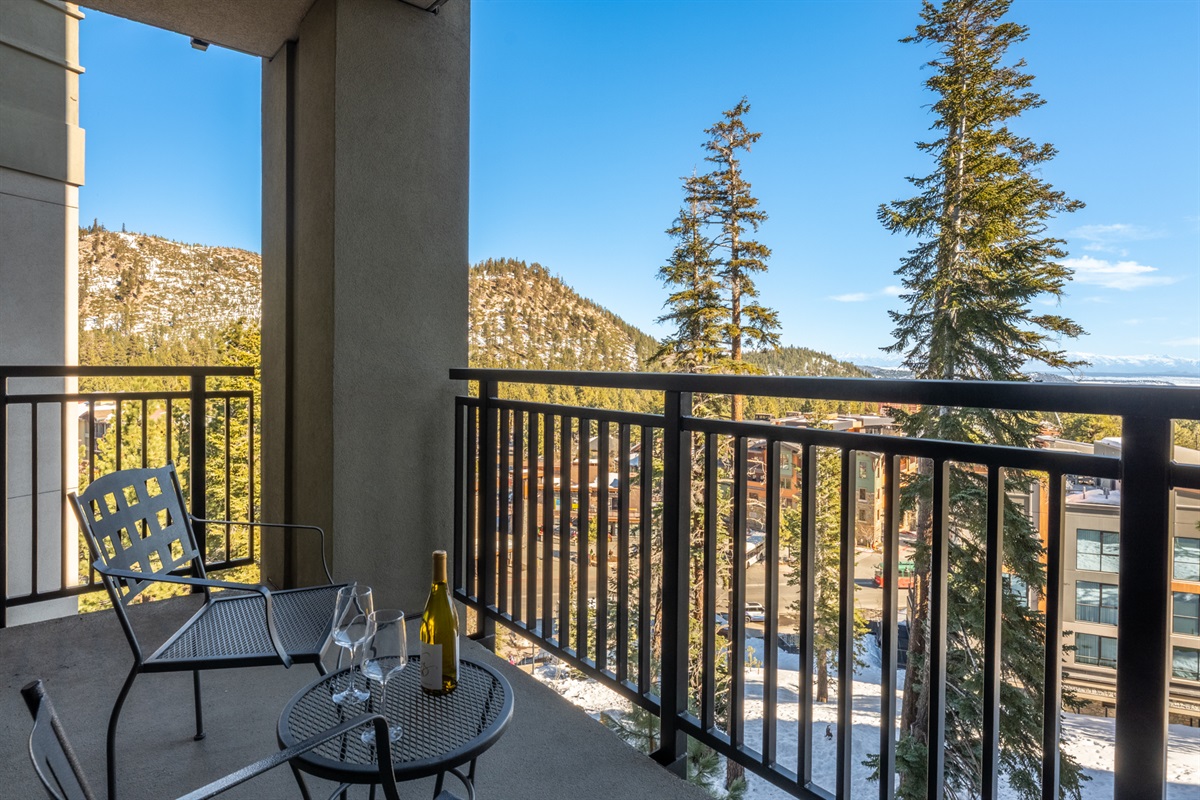 Step onto the private balcony and enjoy a quiet moment above the Village—an ideal perch for slow mornings and easy evenings.