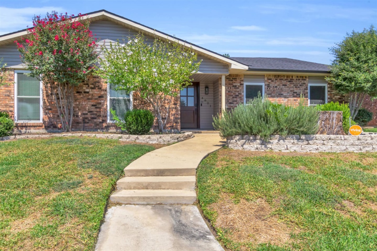 Charming brick exterior sets the tone for warm and welcoming stay!