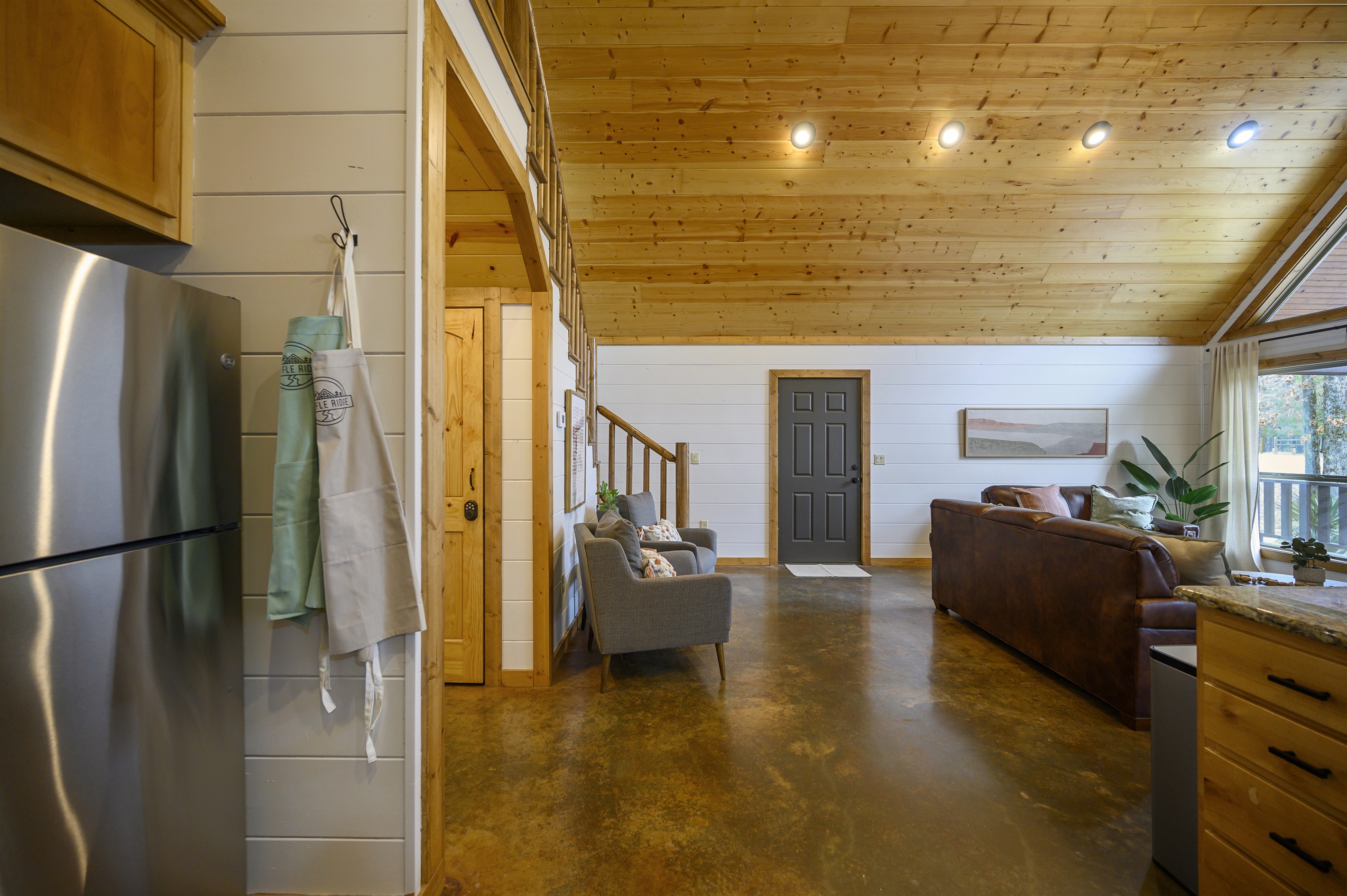 Stretch out and unwind in our expansive living room – where relaxation knows no bounds