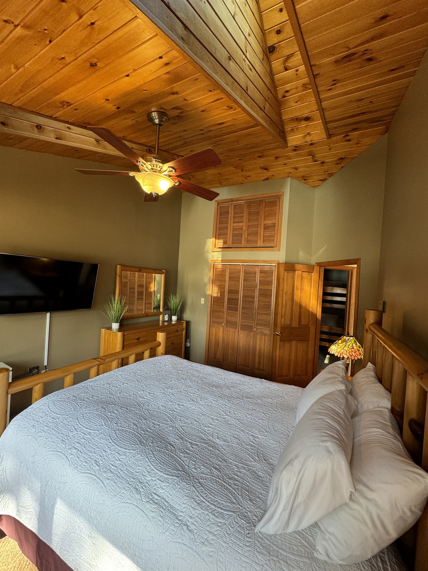 Camp Havon 2nd floor master bedroom so much natural light coming in the from private balcony!