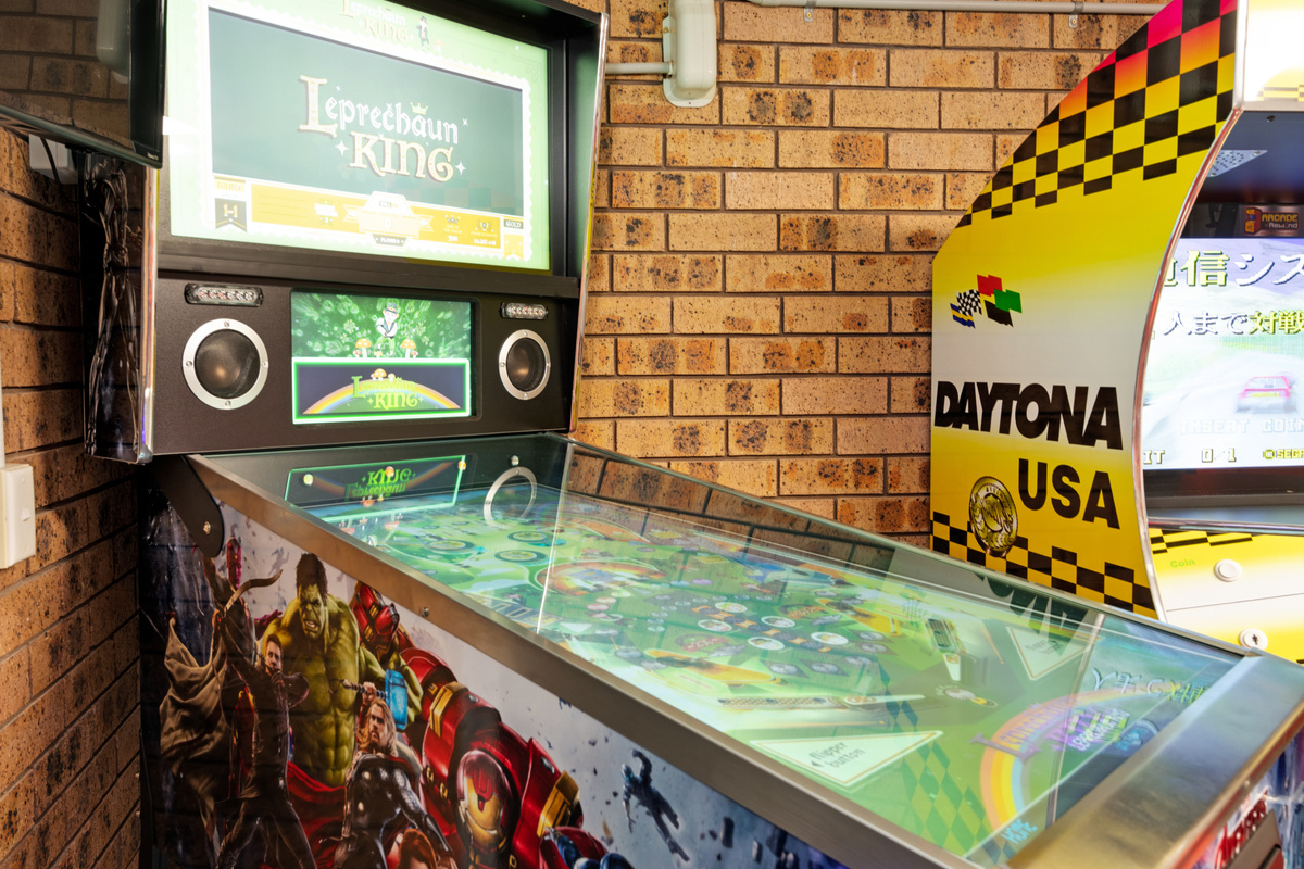 The games room at Skye’s Beach House includes a digital pinball machine with 1,300 games alongside the Daytona and arcade machines.