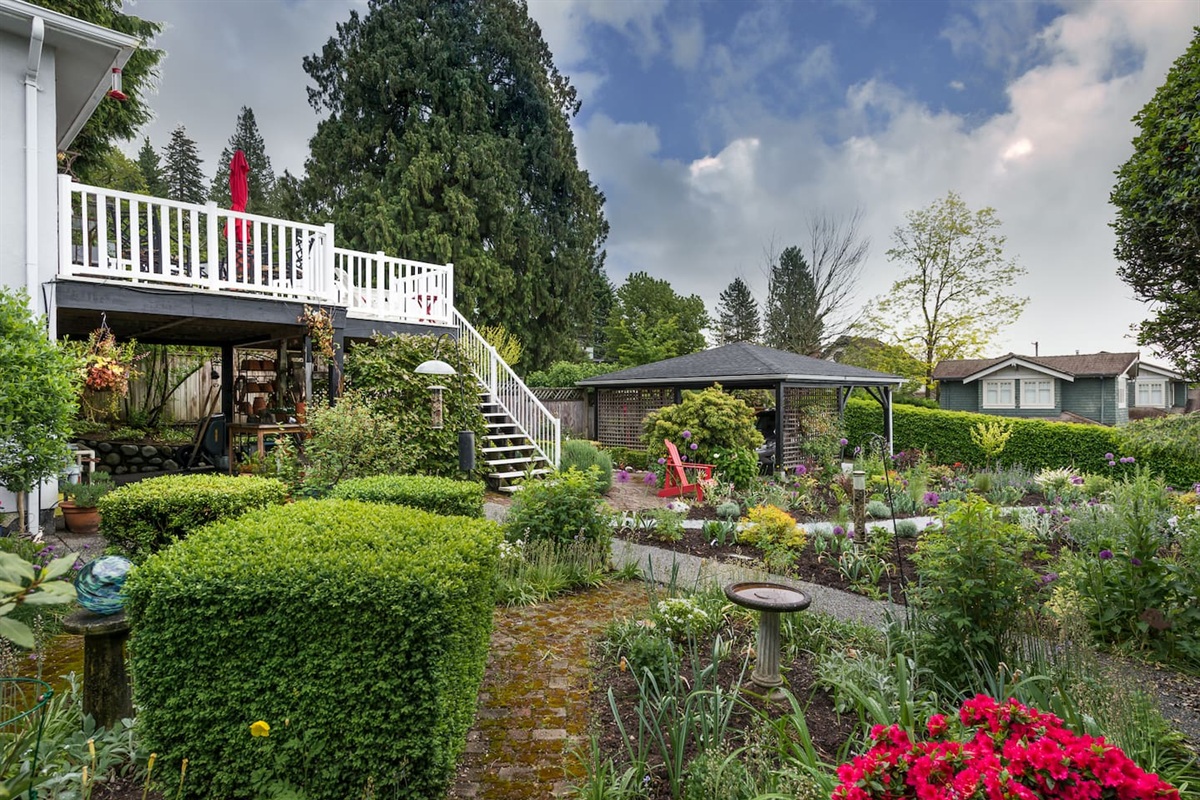 Back garden courtyard with steps leading to the upper deck.