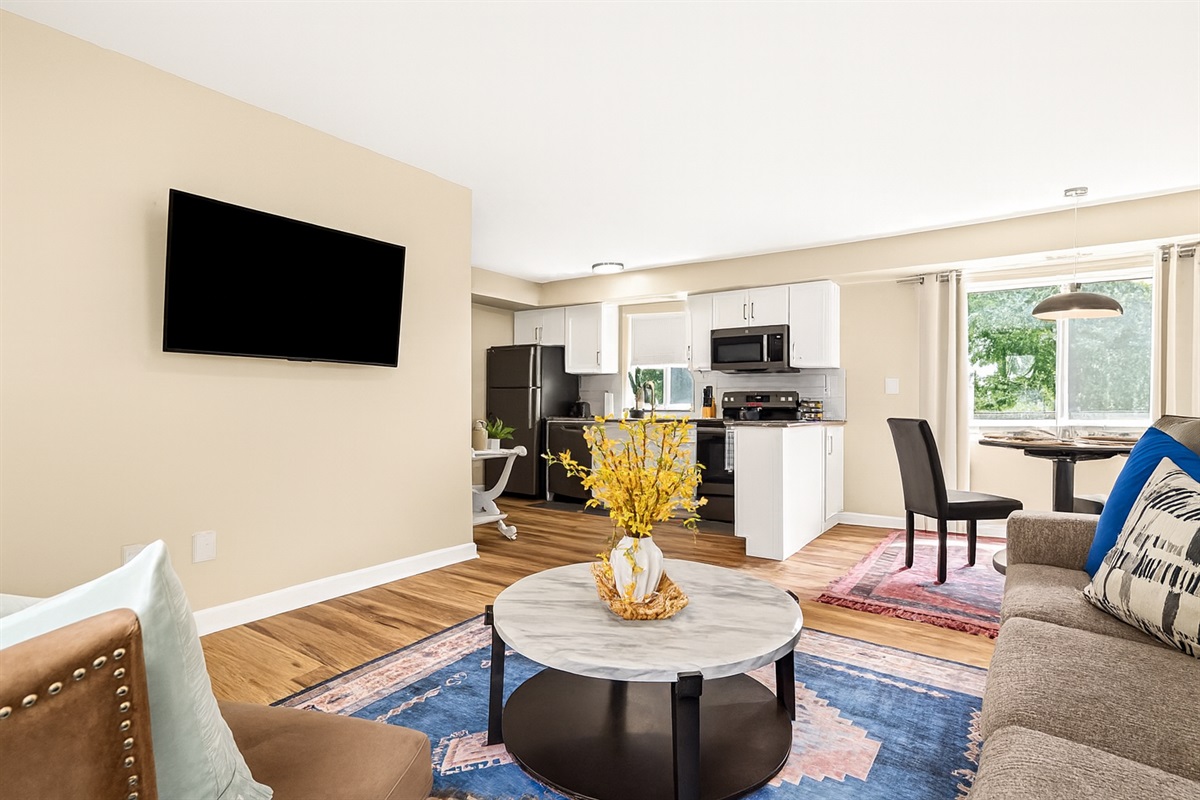 Relax in our inviting lounge space, furnished with cozy seating and a smart TV to elevate your entertainment experience.