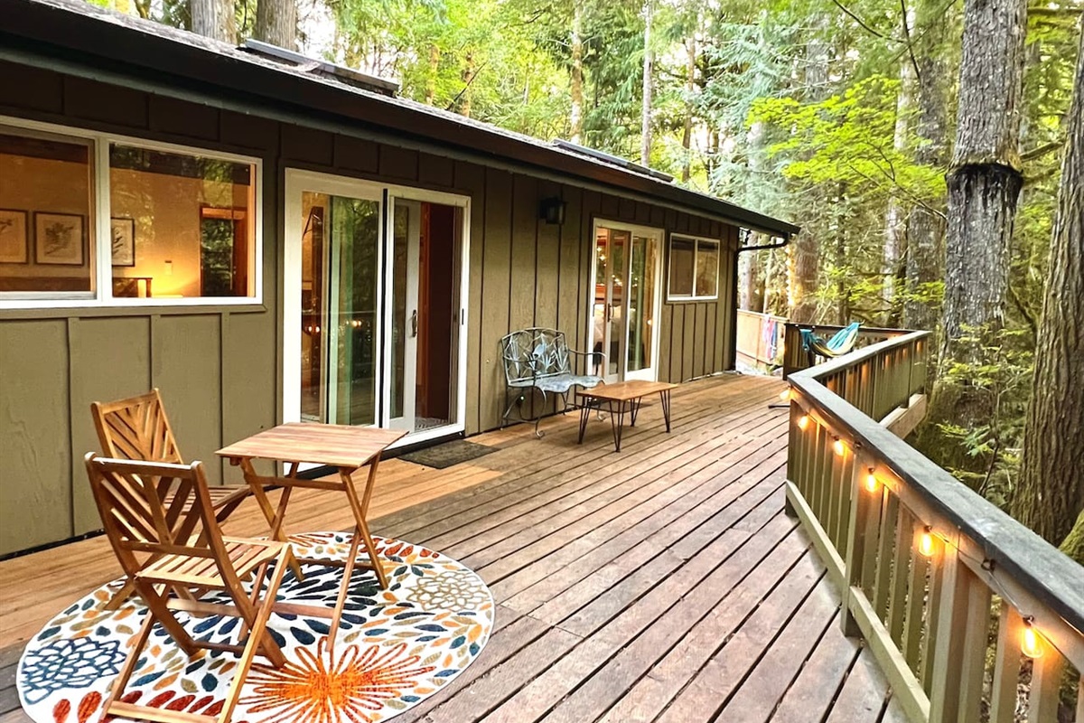 Back Deck on main floor level, overlooking the Sandy River. Access from Main Level Living Room, Master Bedroom, and King Size Guest Bedroom.