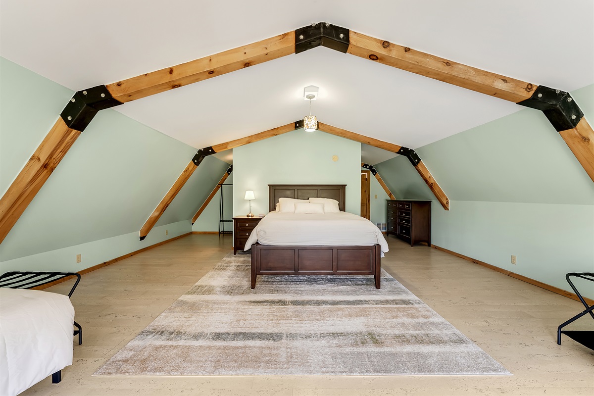 Bedroom #4 with queen bed and 2 twin beds.