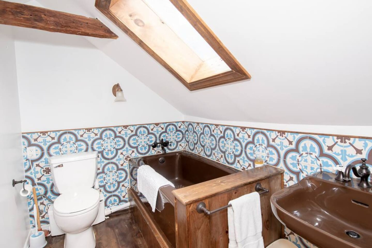 Upstairs bathroom with tub (no shower)