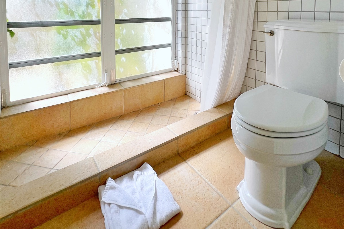 Thoughtfully designed bathrooms with a clean and airy aesthetic create a peaceful retreat.