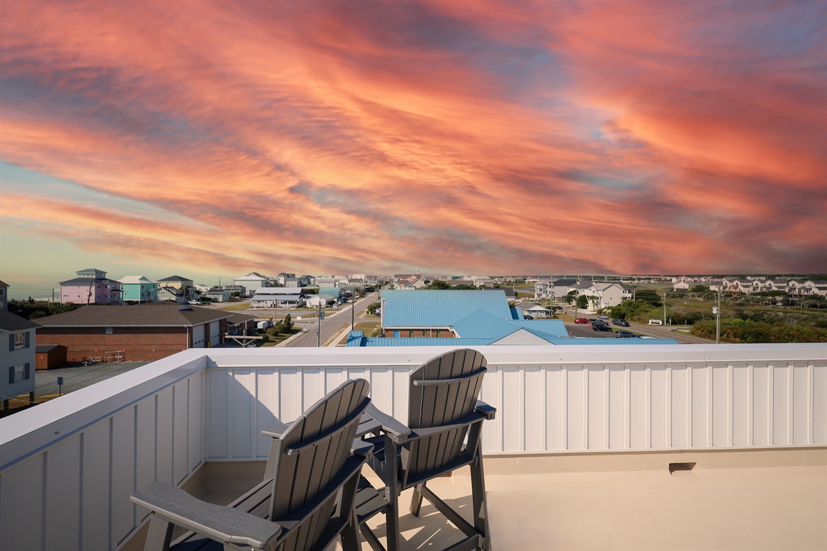 The balcony offers a stunning sunset.