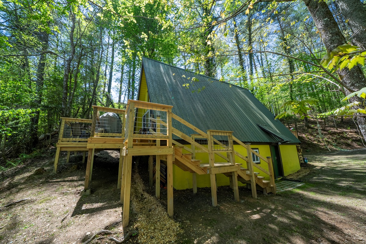 The exterior staircase leads to the private second bedroom, offering added separation and flexibility for your stay.