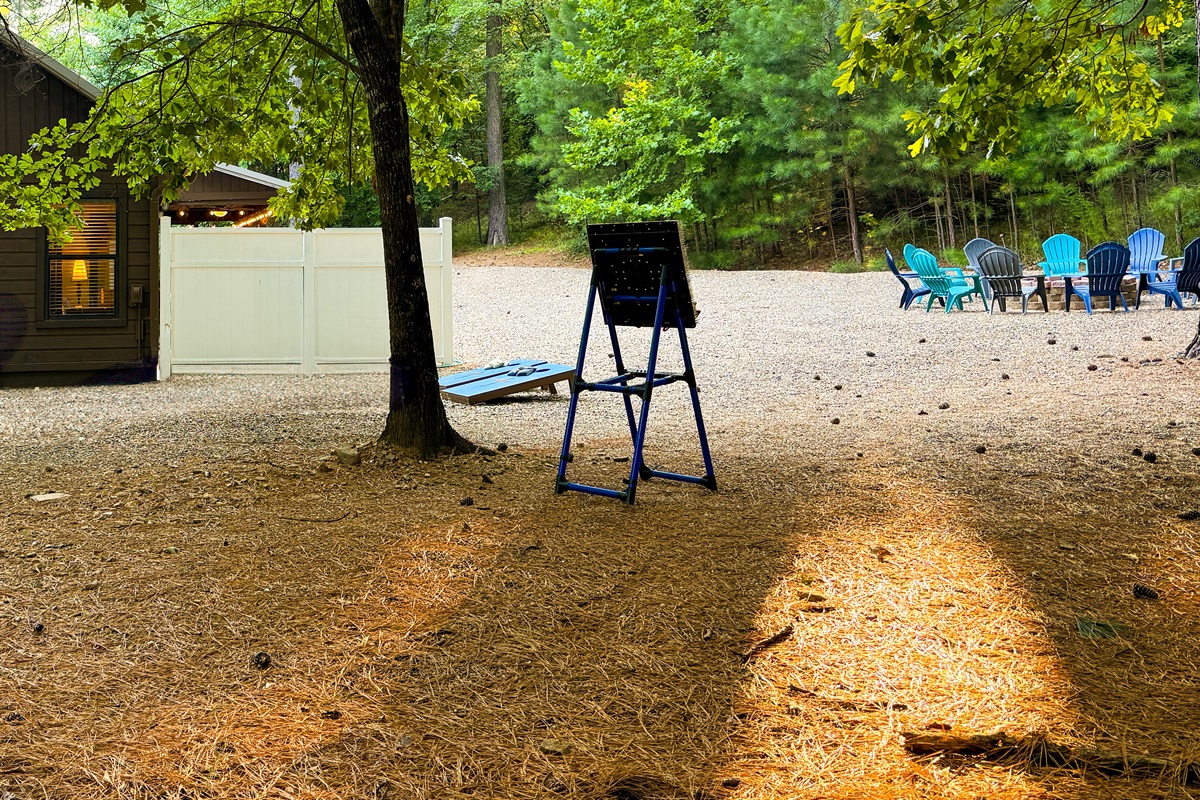 Challenge your crew to a backyard cornhole tournament in the shaded pine grove.