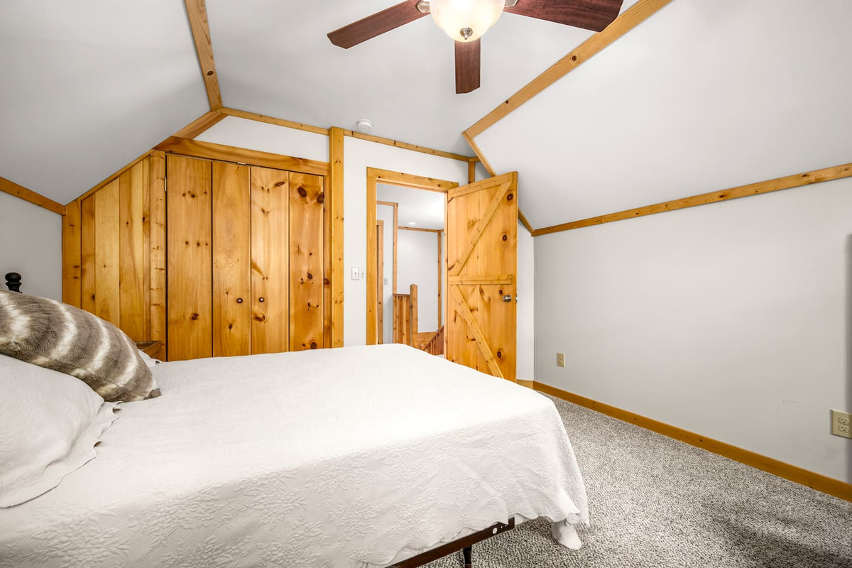 Bedroom #2 located on the upper level of the cabin queen bed