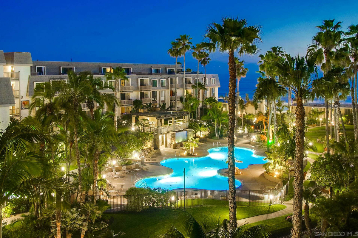 Calming pool and tropical landscaping at North Coast Village.