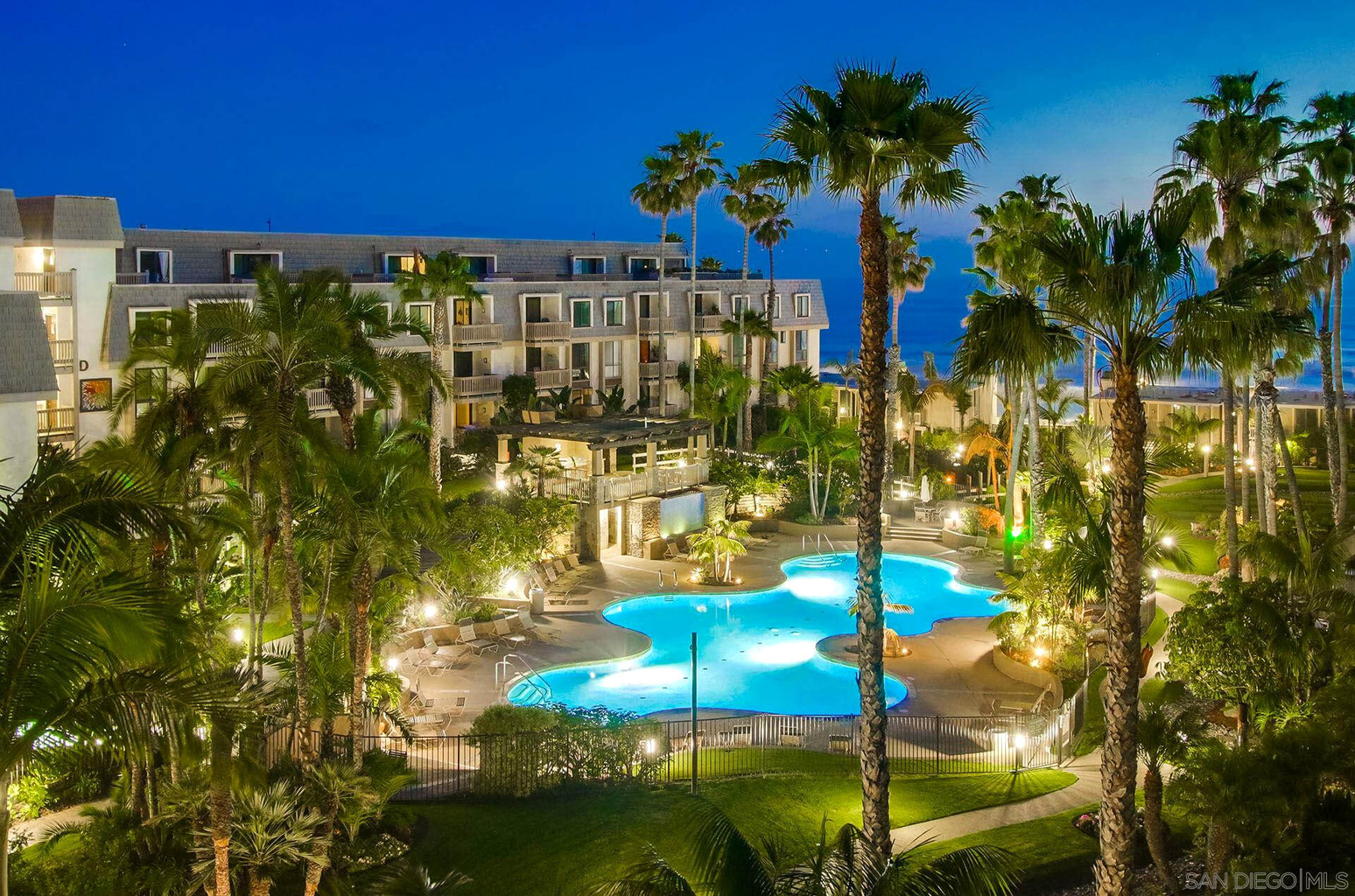 Calming pool and tropical landscaping at North Coast Village.