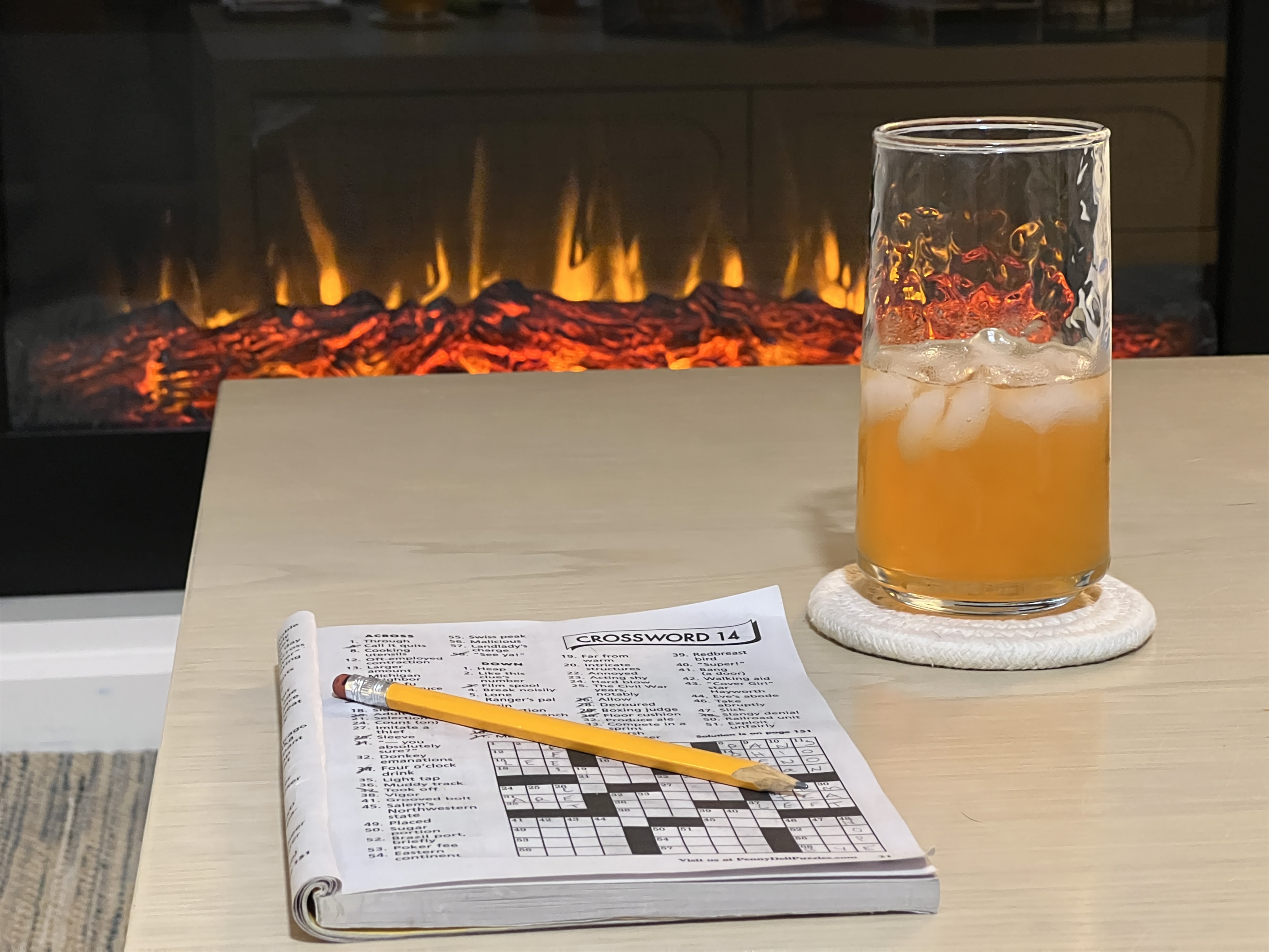 Warm up by the electric fireplace with your favorite crossword or book