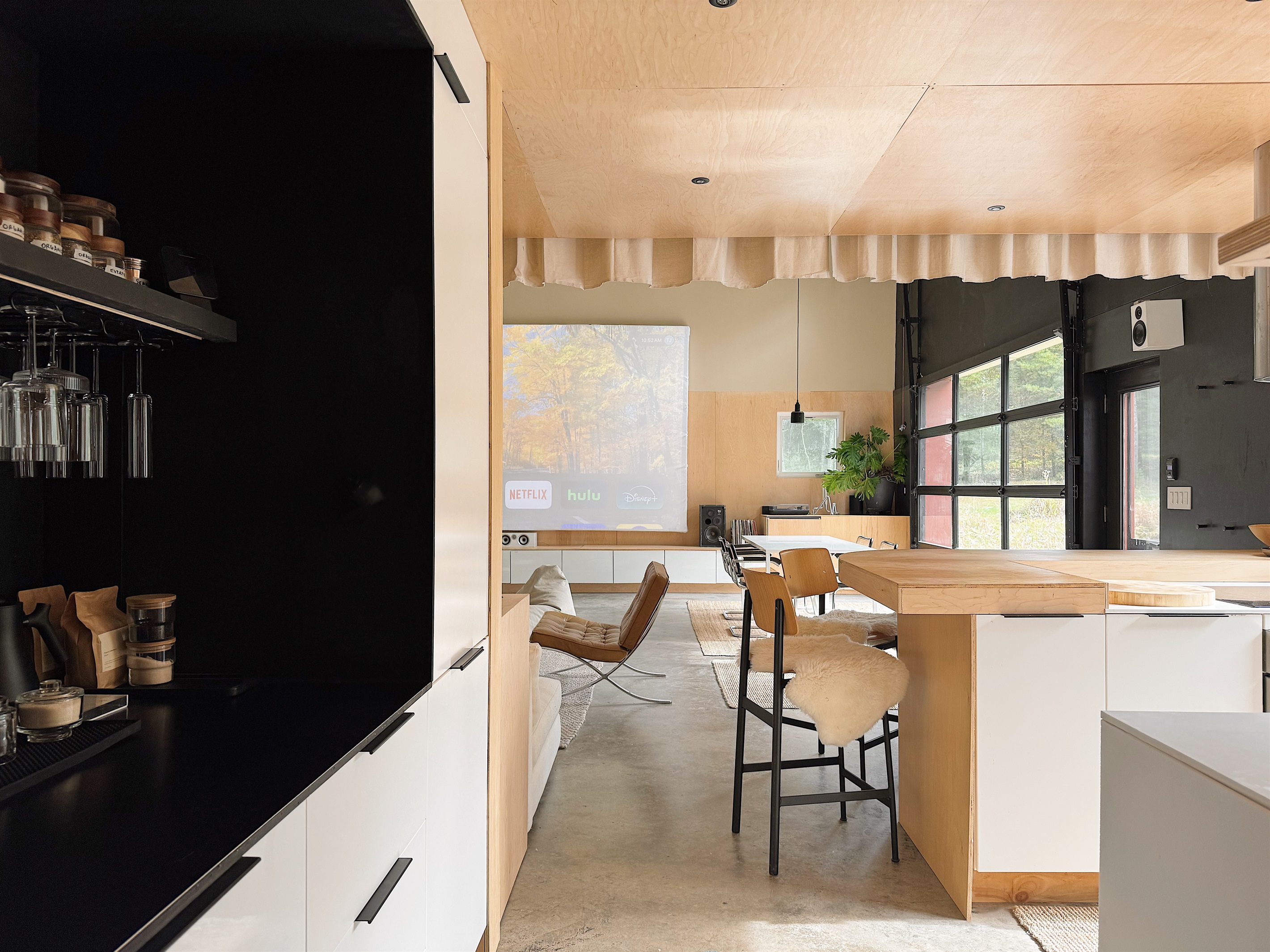 Kitchen and coffee bar with view of the projector screen,