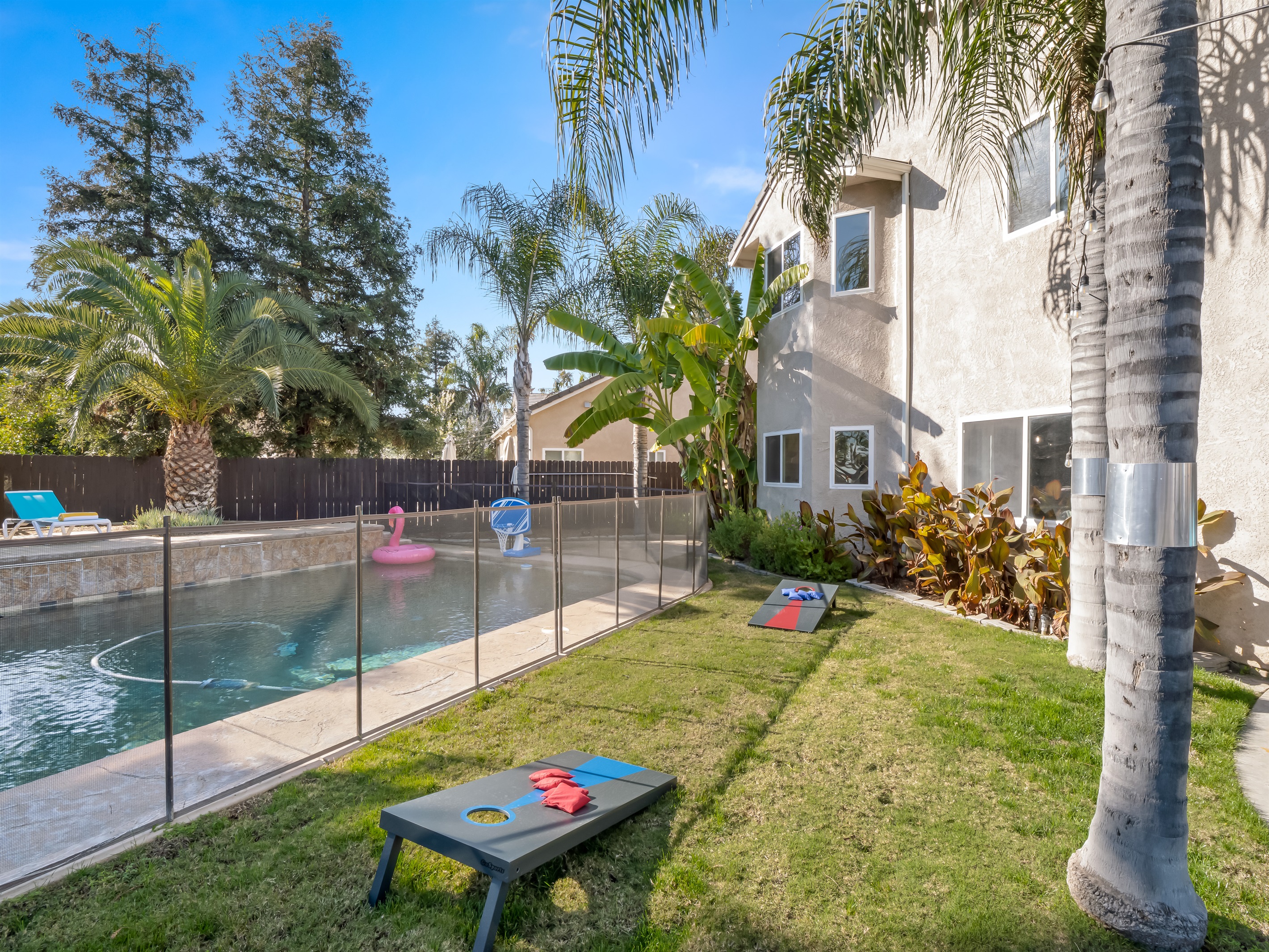 Sunny days start here. Splash in the pool, lounge under the palms, and make unforgettable vacation memories.