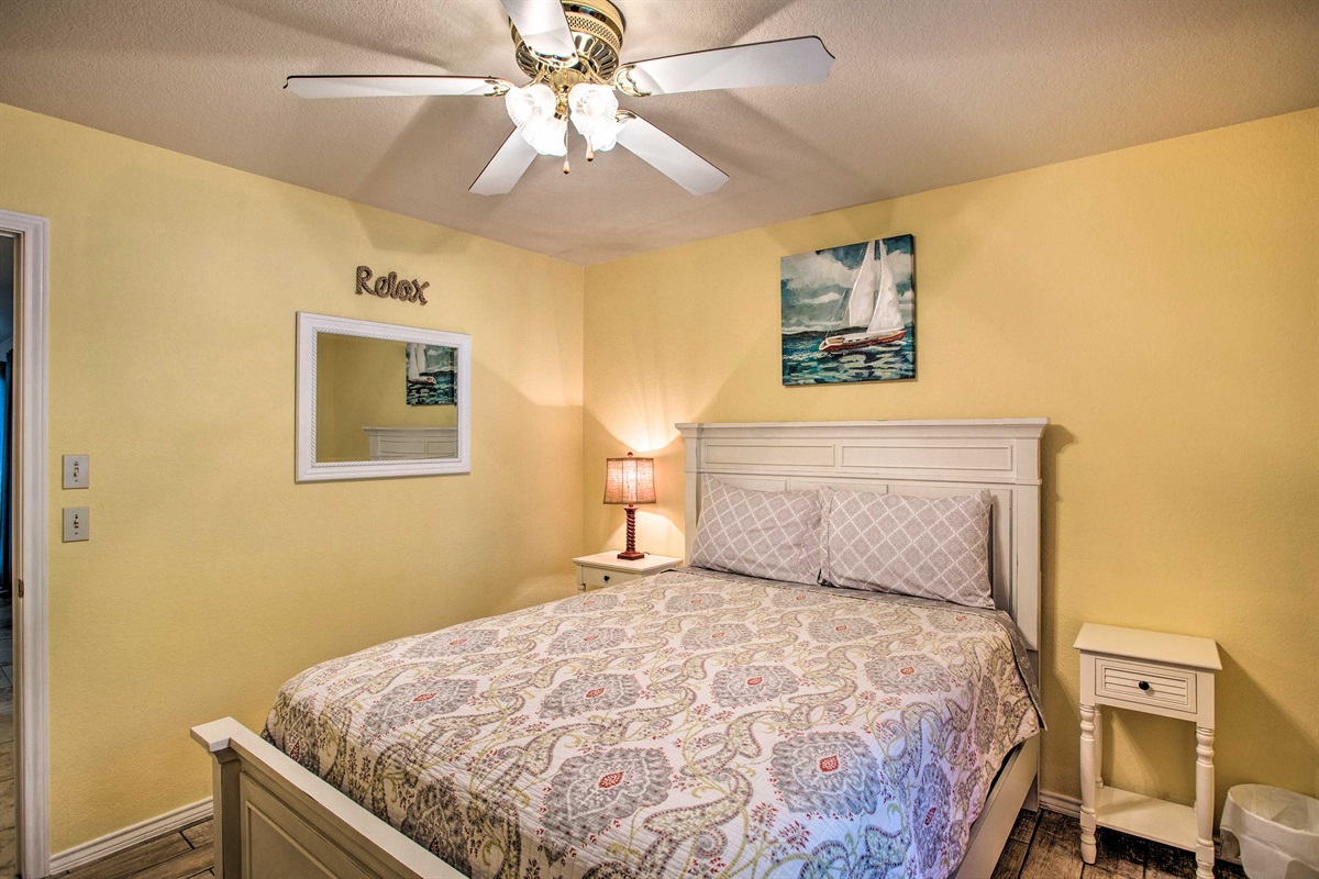 Yellow bedroom with queen size bed