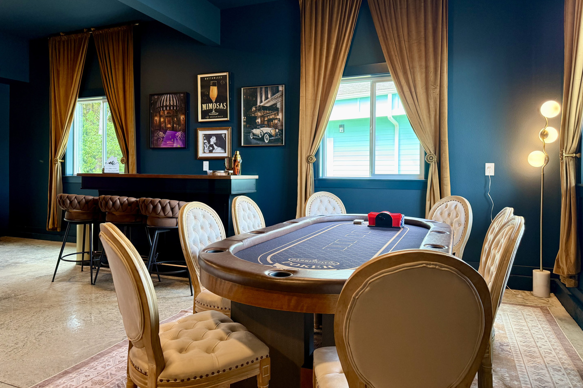 Poker night in the Octopus Room — a full felt table with the bar just steps away.