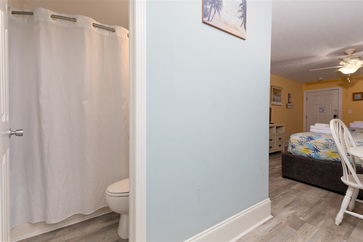 Clean, updated bathroom, conveniently located just off the main living and sleeping area