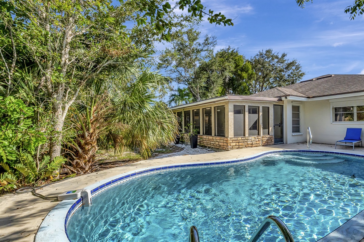 The heated pool is the jewel in the crown of this home