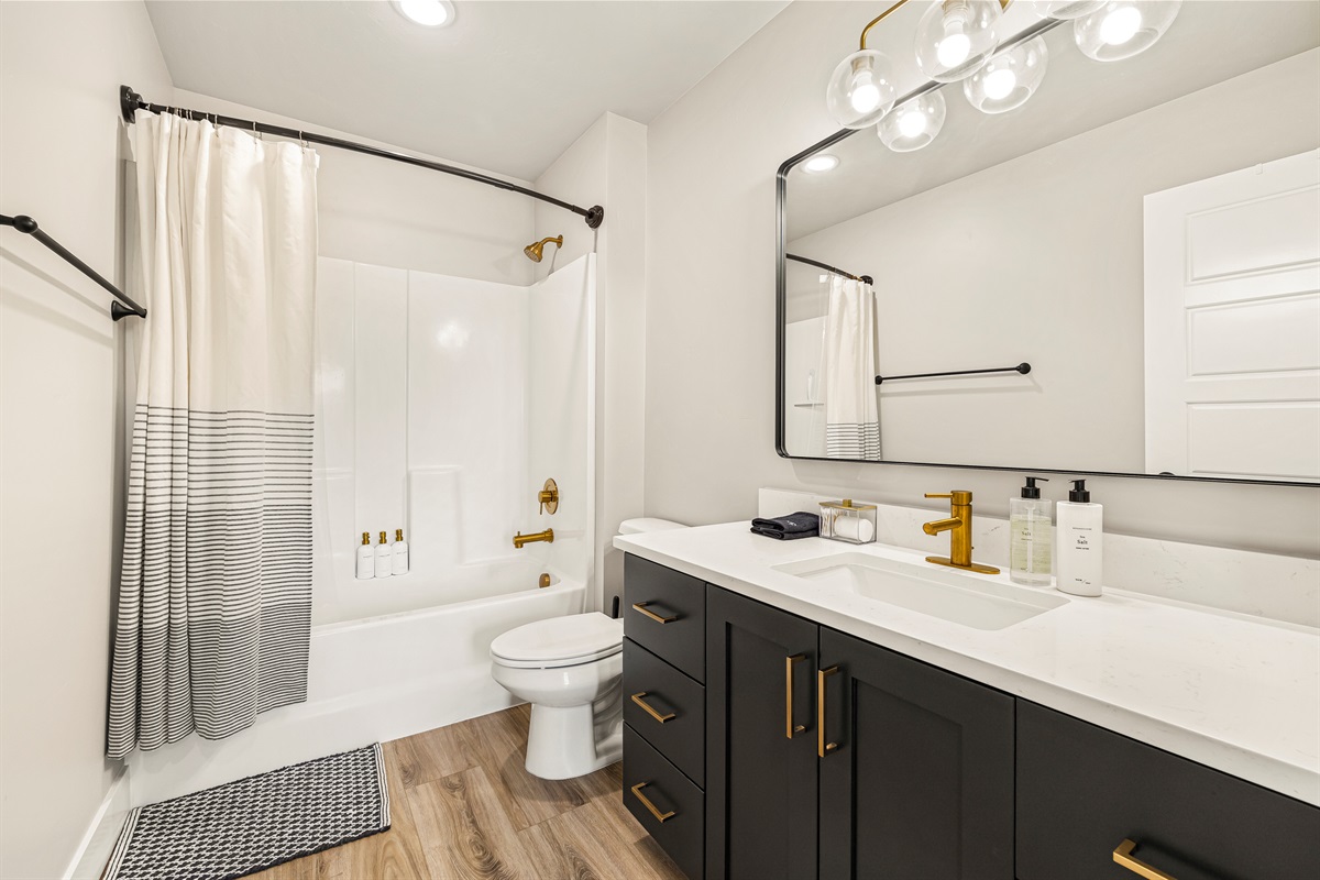 Second full bathroom located upstairs next to bedroom 2 and 3. 