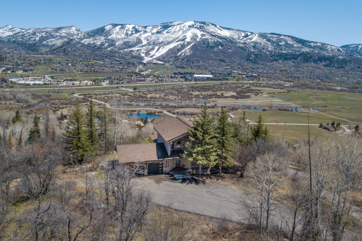 Aerial Shot of House with Steamboat Resort in Background
