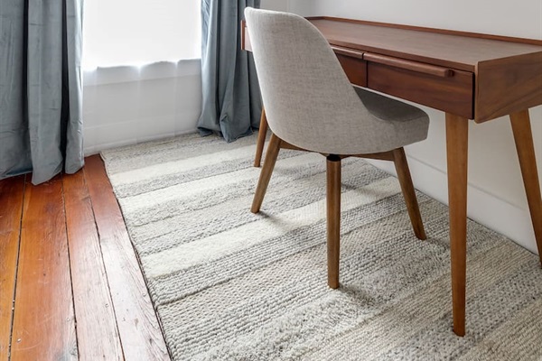 Workspace: Bright workspace with stylish desk and calming views for productive stays!