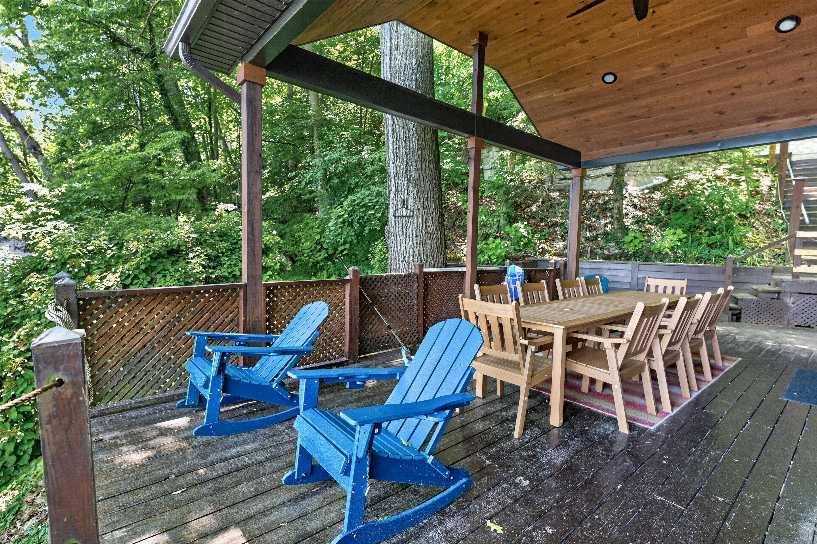 Deck seating with blue Adirondack chairs
