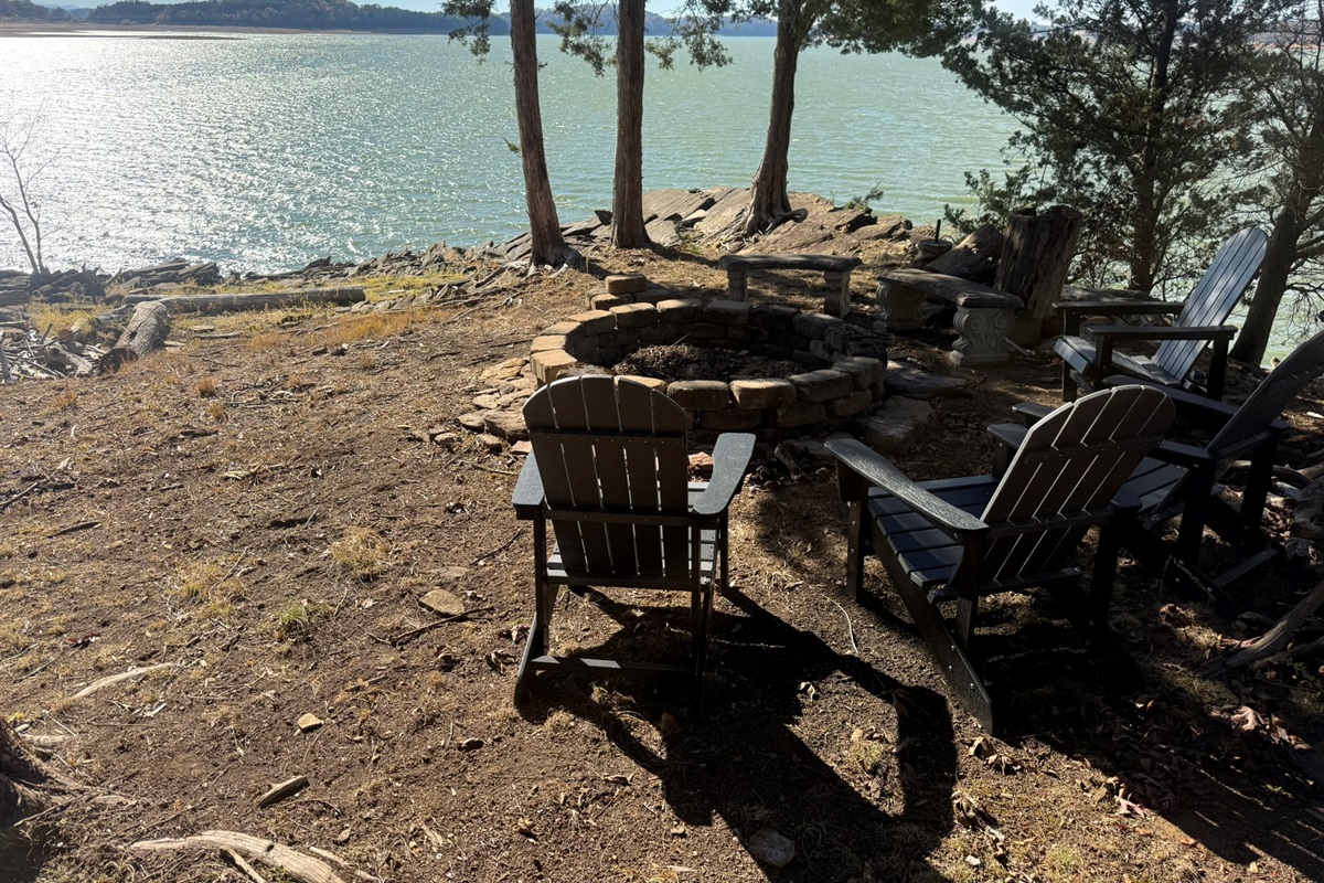 Fire pit down close to water on the point of the peninsula