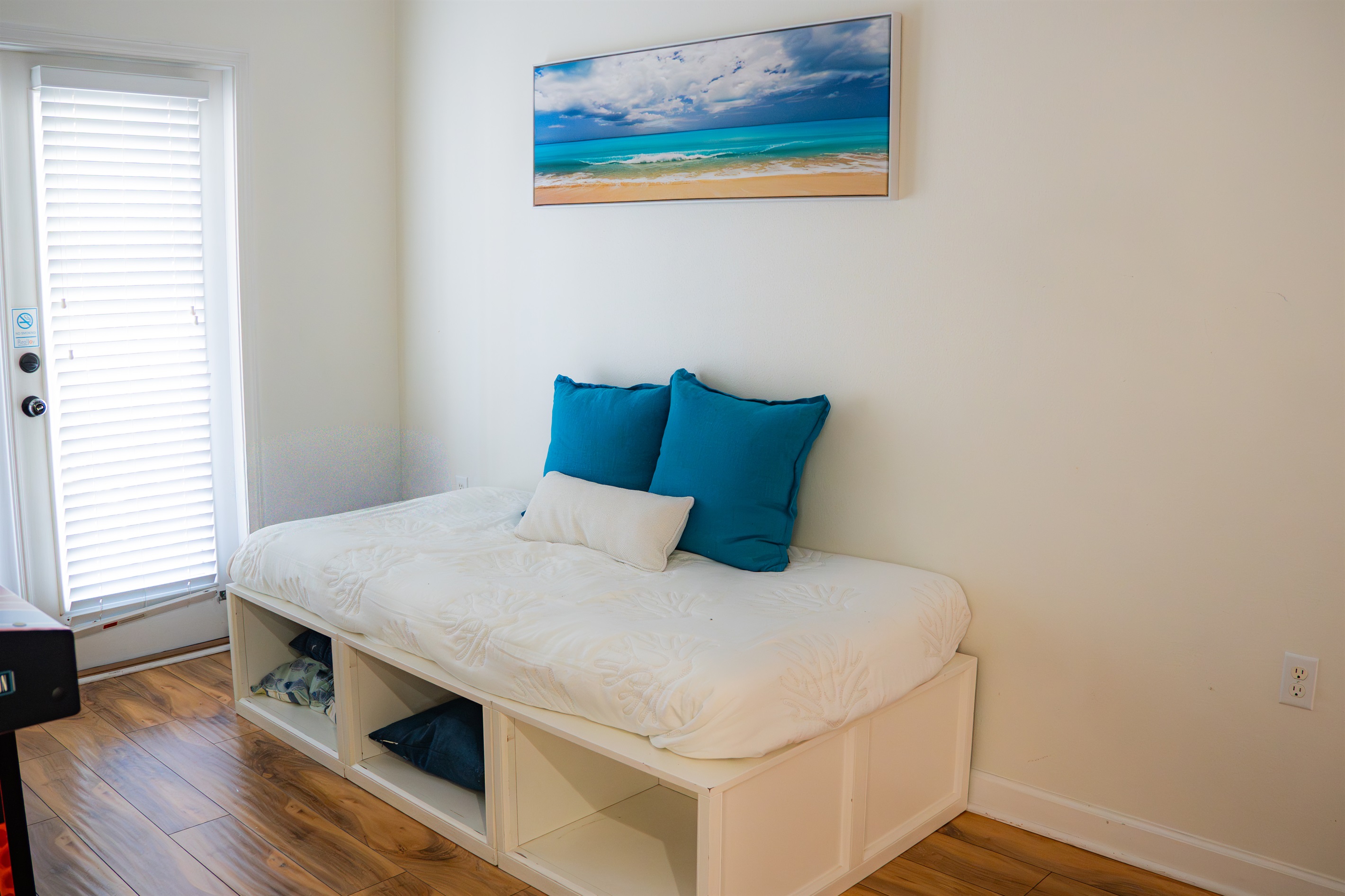 The loft has a twin daybed, TV, and direct access to the balcony, a fun bonus space that works great for kids or teens who want their own hangout.