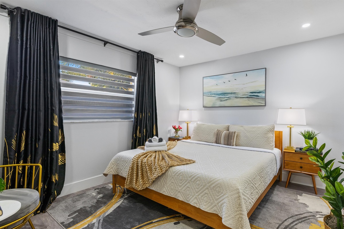 Bedroom 3 is equipped with a king-sized bed, black-out curtains, a nightstand, and a closet.