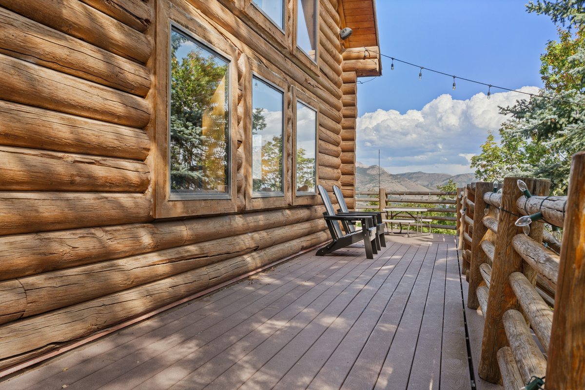 Exterior deck seating just outside the cabin’s large windows and living areas.