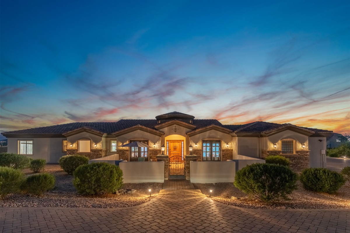 Grand front entrance welcomes you to a private luxury retreat designed for gathering, relaxing, and celebrating together