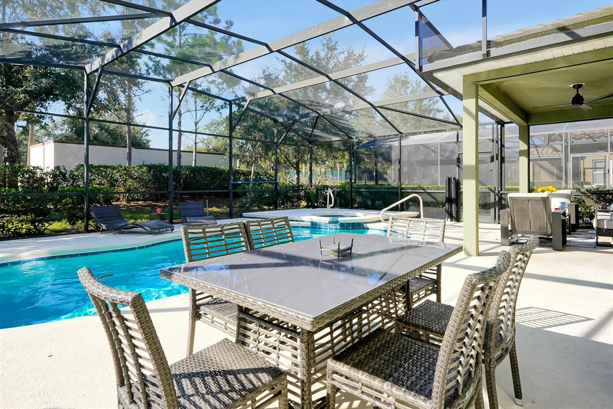 Enjoy a meal outside at the pool side dining area.