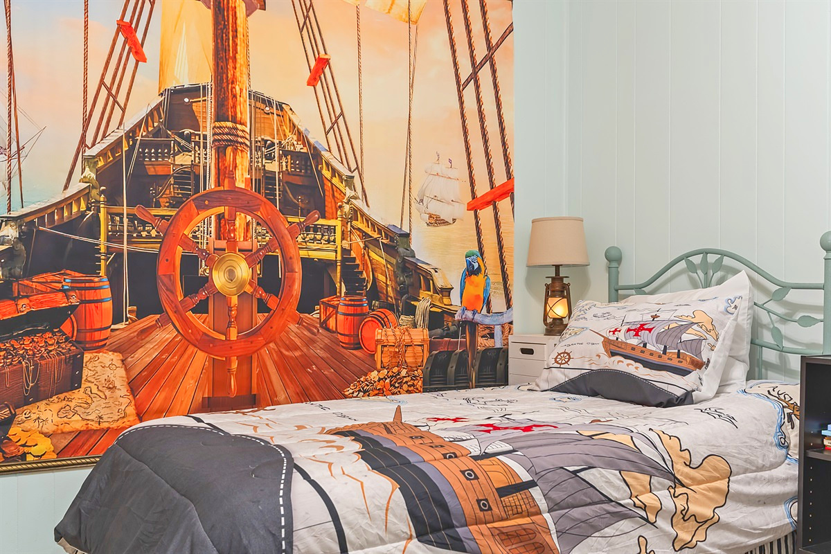 Second Bedroom – Pirate-themed room with two twin beds, a kid favorite!