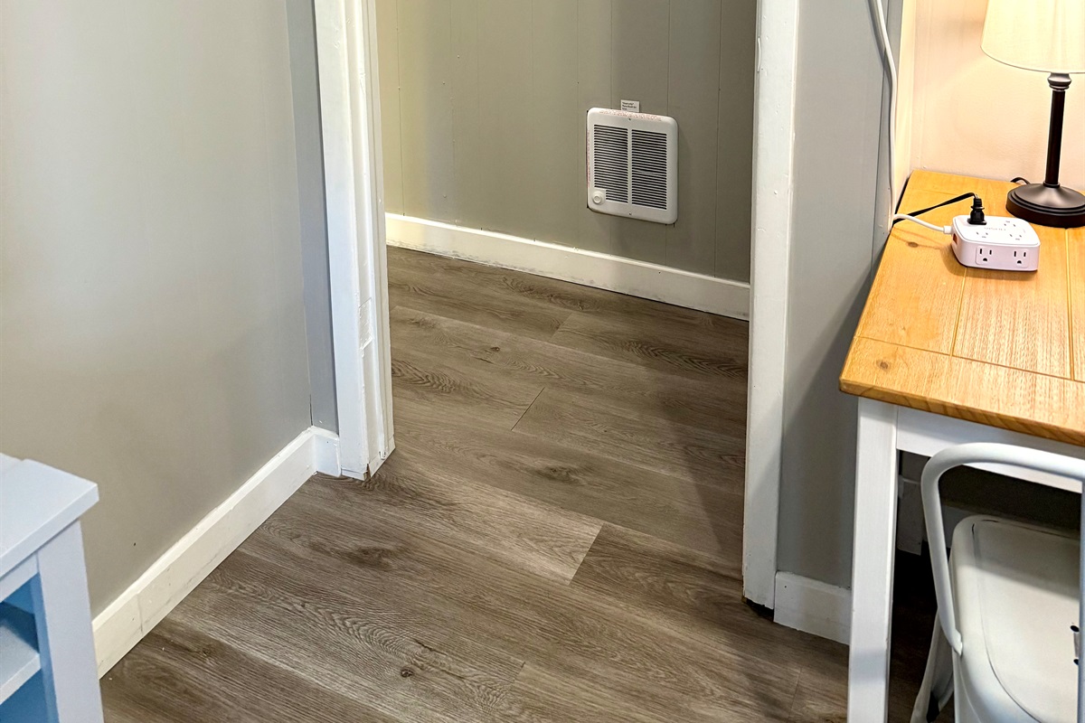 Hall leading to king bedroom and full bathroom.