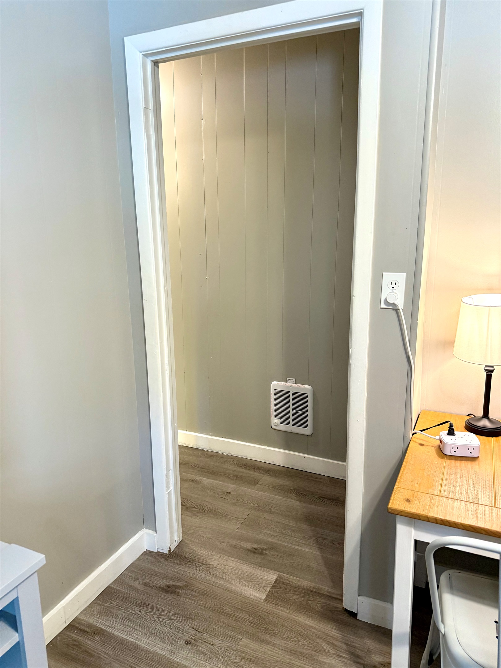 Hall leading to king bedroom and full bathroom.