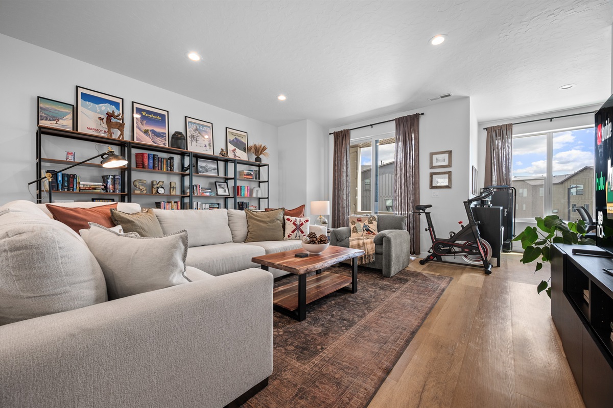 Bright, open-concept living room with stylish décor and plenty of space to relax.
