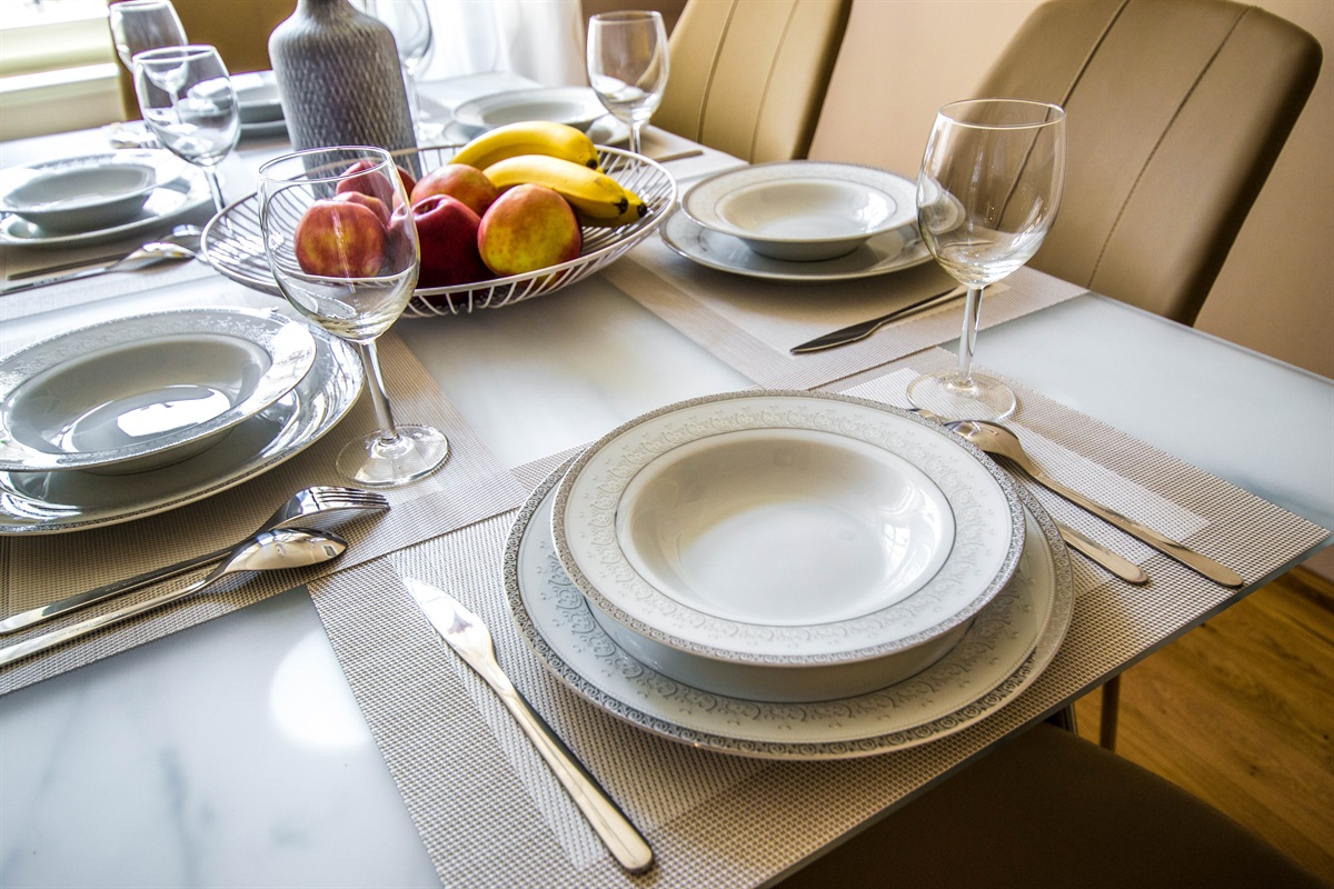 All tableware for a family or friends' dinner is in the kitchen