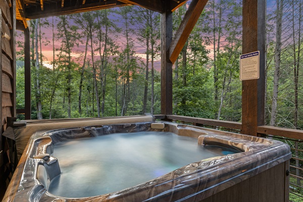 The bubbling hot tub offers a relaxing escape, perfect for unwinding under the stars.