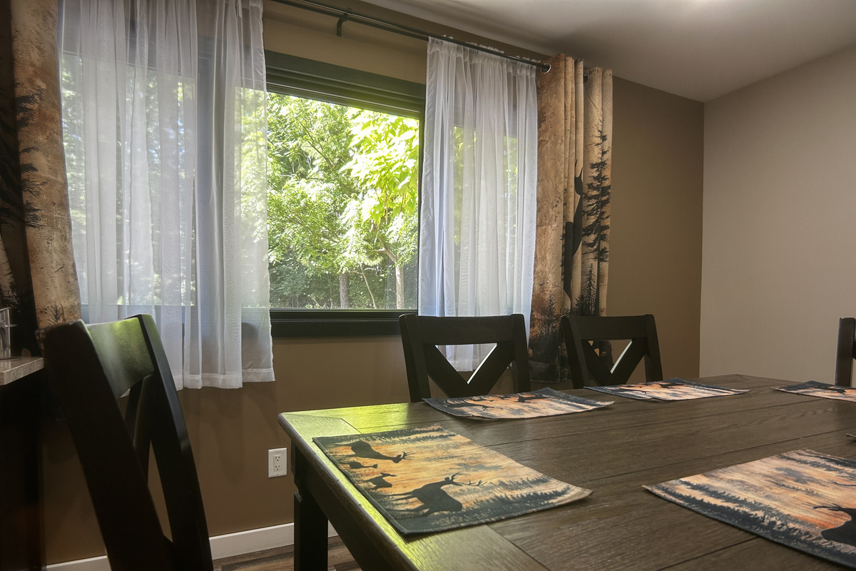 Watch deer in the front yard while eating at the dining room table.
